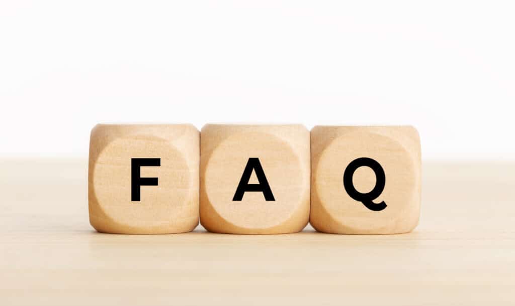 FAQs or frequently asked question concept. Wooden blocks with text on desk. FAQs for Residential HVAC Codes