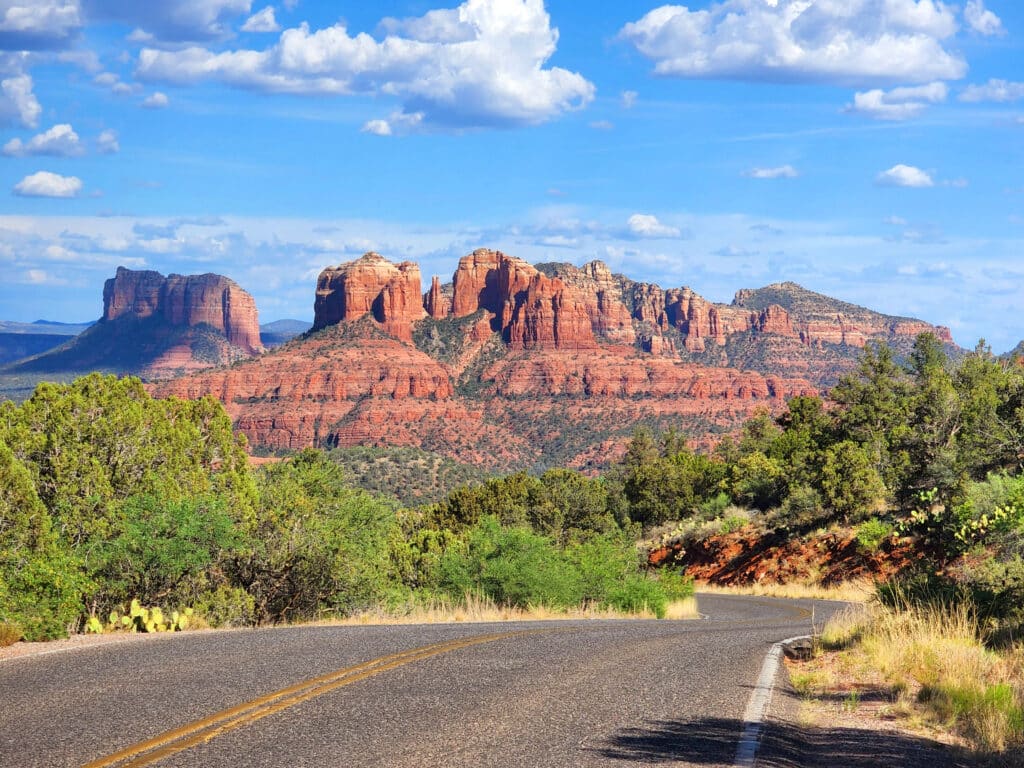 Driving through Sedona, Arizona, USA toward the desert mountains.