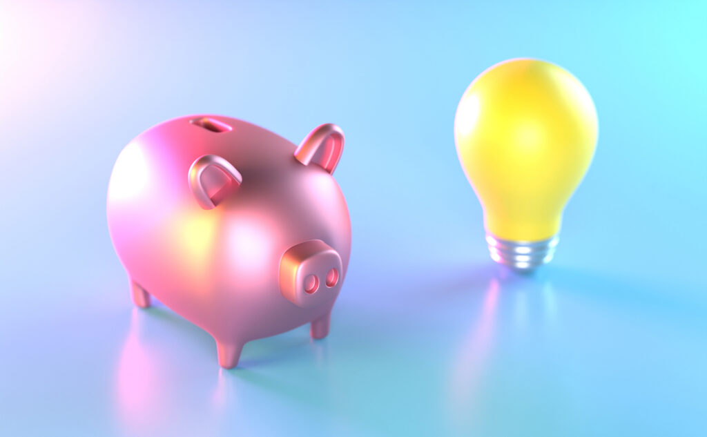 Piggy Bank And Light Bulb On Blue Background: Cost-Effective AC Repair in Mesa, AZ, AC Repair in Payson, AZ.