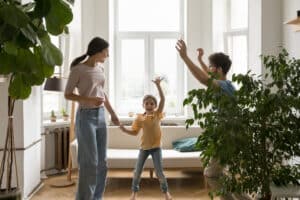 Family have fun dancing at home, Furnace Issues.